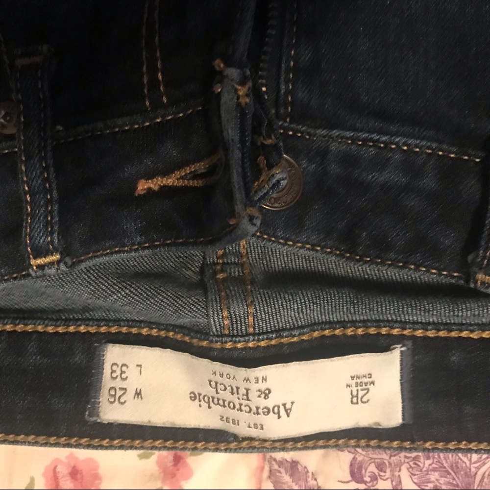 A&F “The A & F Boot” distresses jeans.